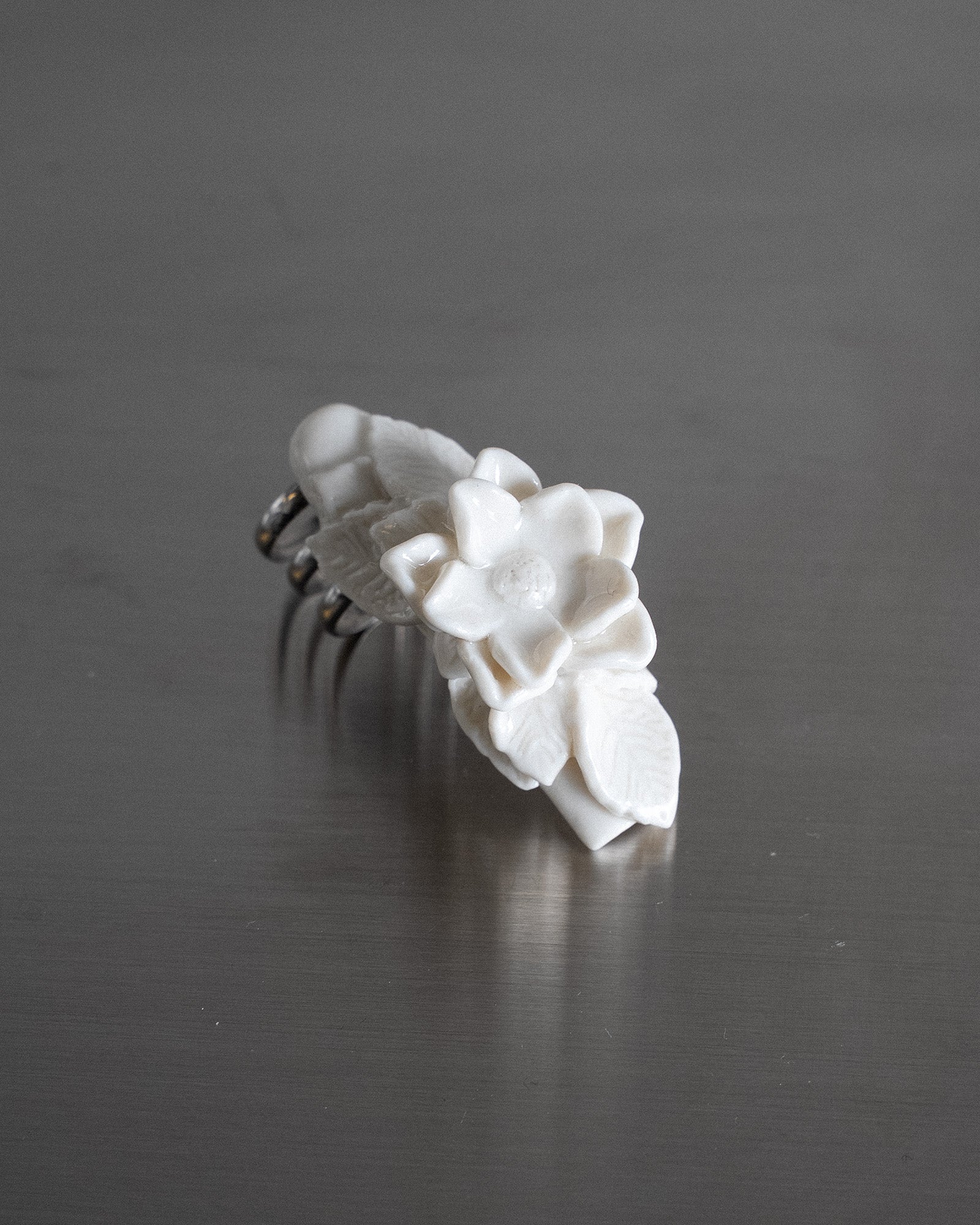 Porcelain Nail Ring “White Flower” #6 (L) by Fatma Cankaya