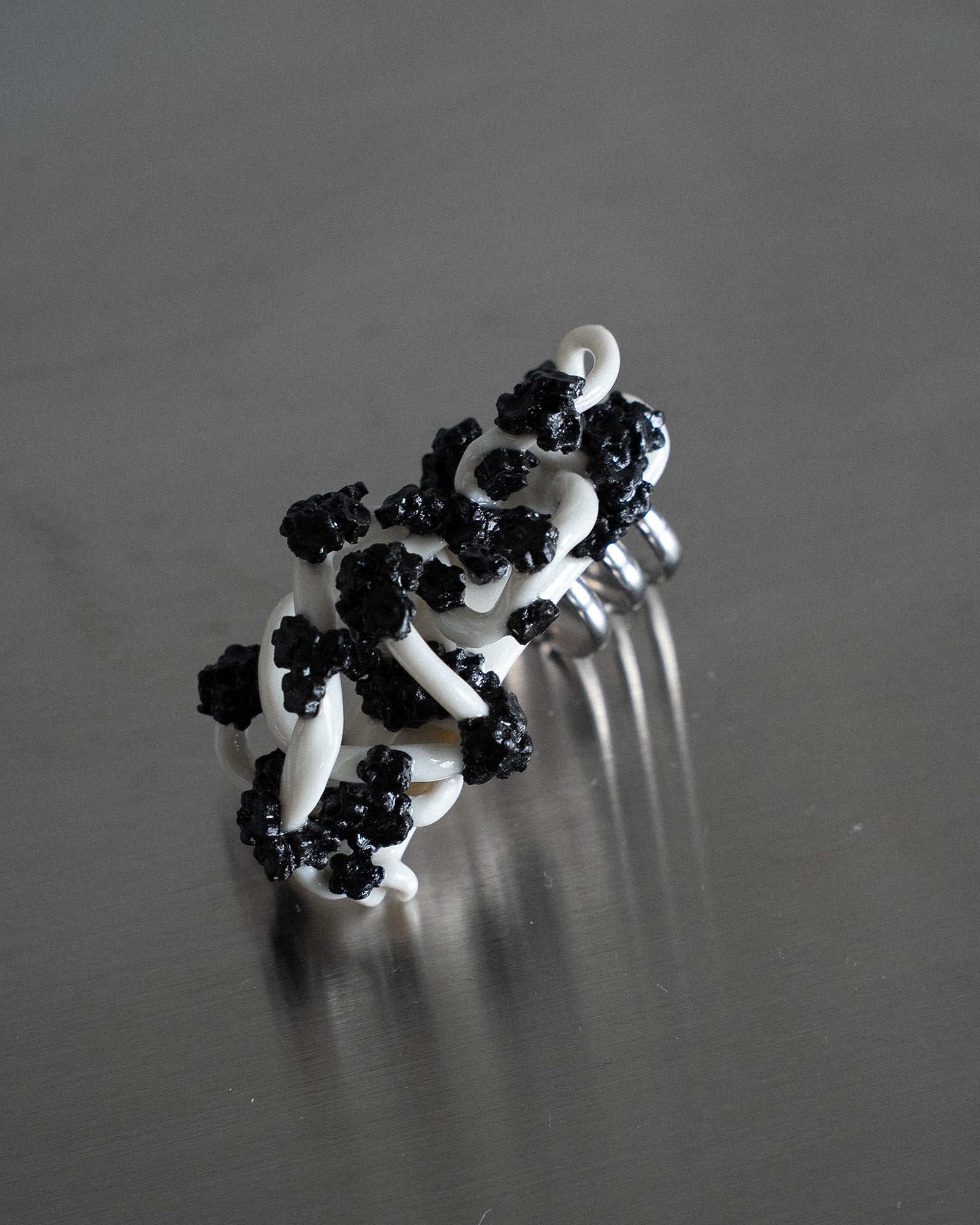 Porcelain Nail Ring “Black Flower” #1 (XL) by Fatma Cankaya