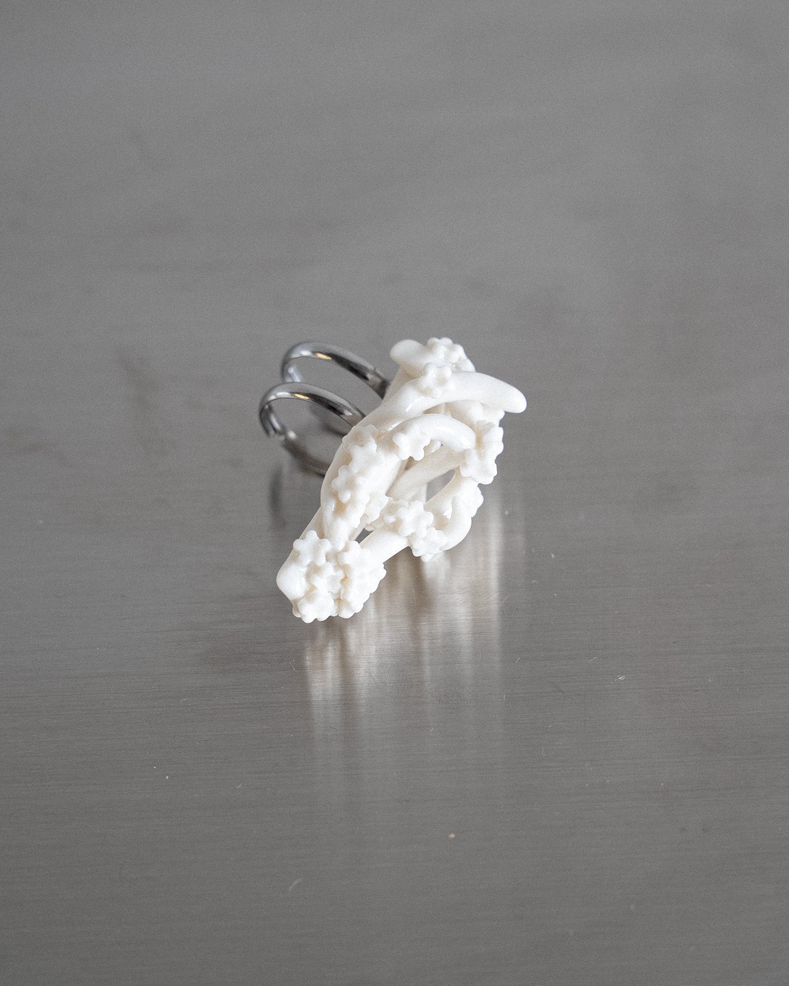 Porcelain Nail Ring “White Flower” #9 (M) by Fatma Cankaya