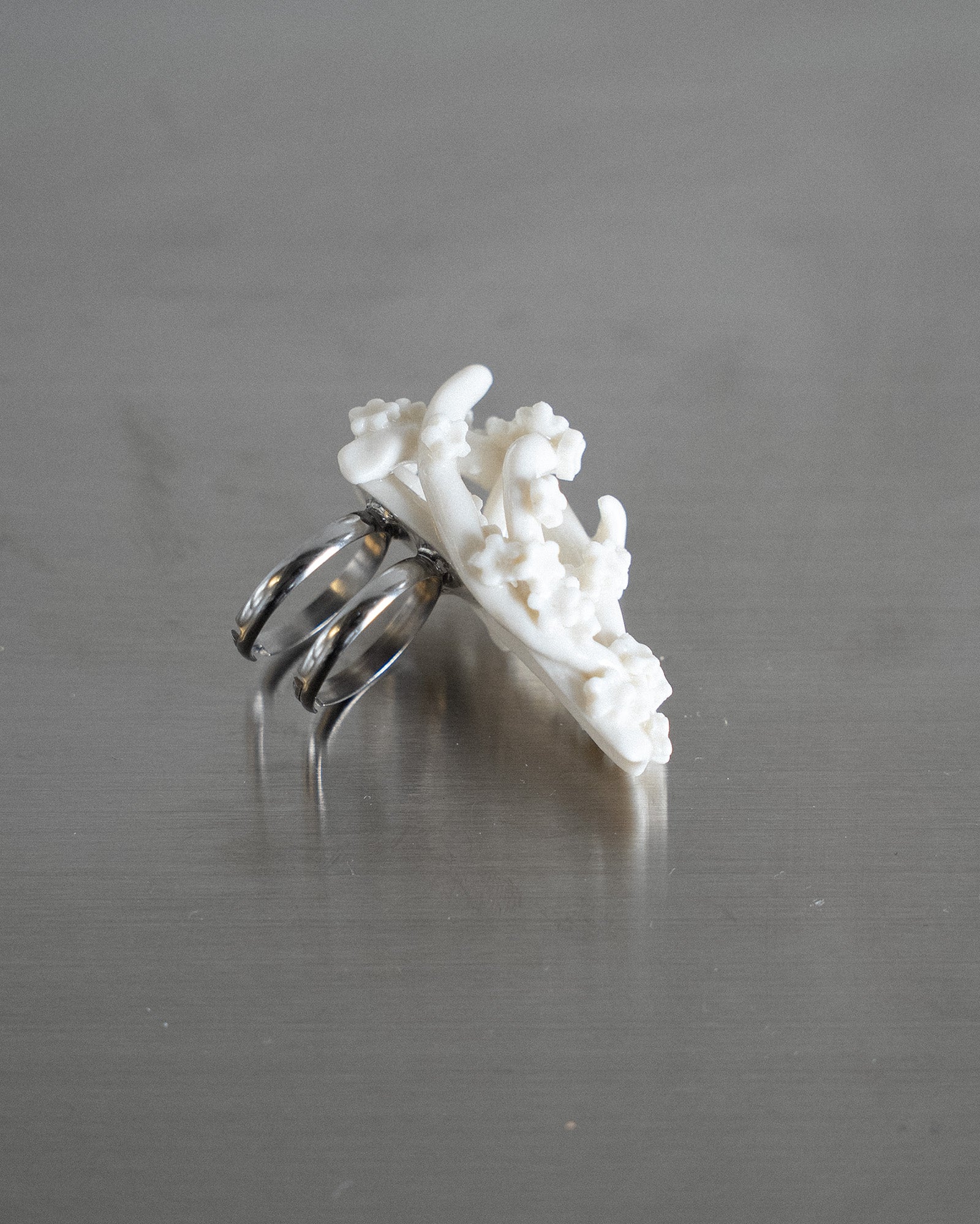 Porcelain Nail Ring “White Flower” #9 (M) by Fatma Cankaya