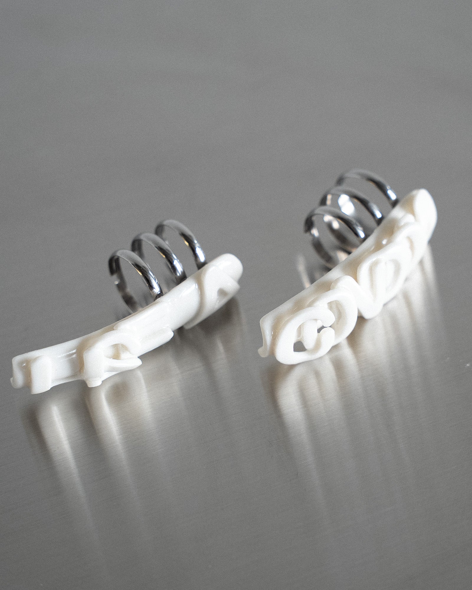 Porcelain Nail Ring “USE A / CONDOM Set” #1 (XL) by Fatma Cankaya